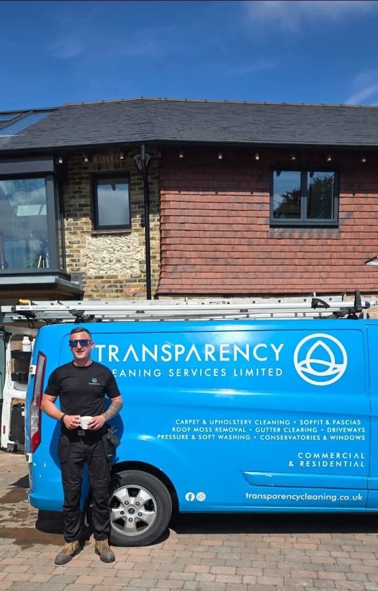 Jonny with a branded Transparency Cleaning Services van